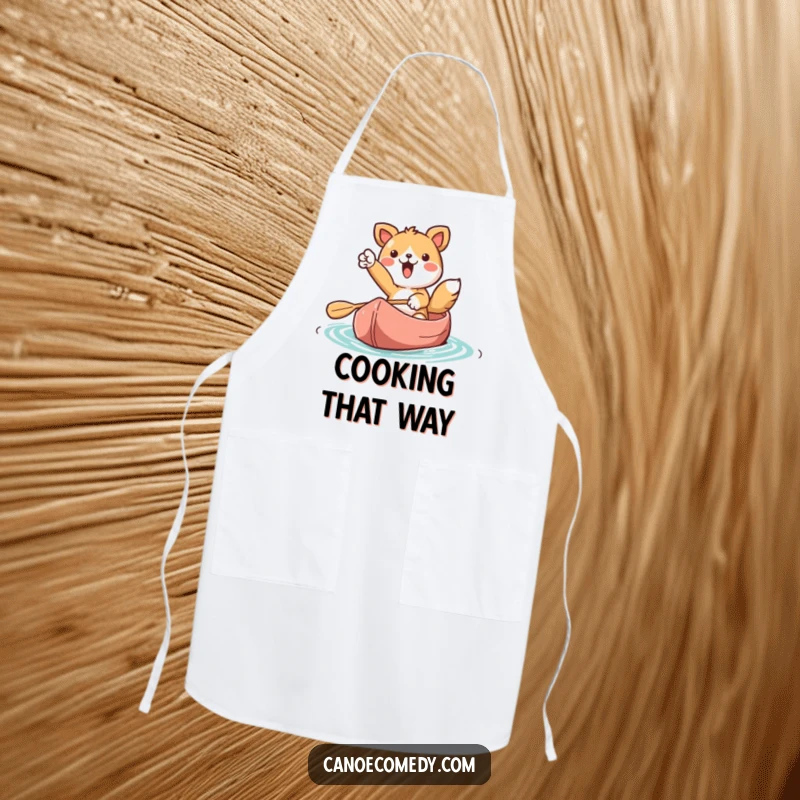 Funny Kawaii animal character in a canoe, pointing ahead, printed on a functional kitchen apron for culinary inspiration.