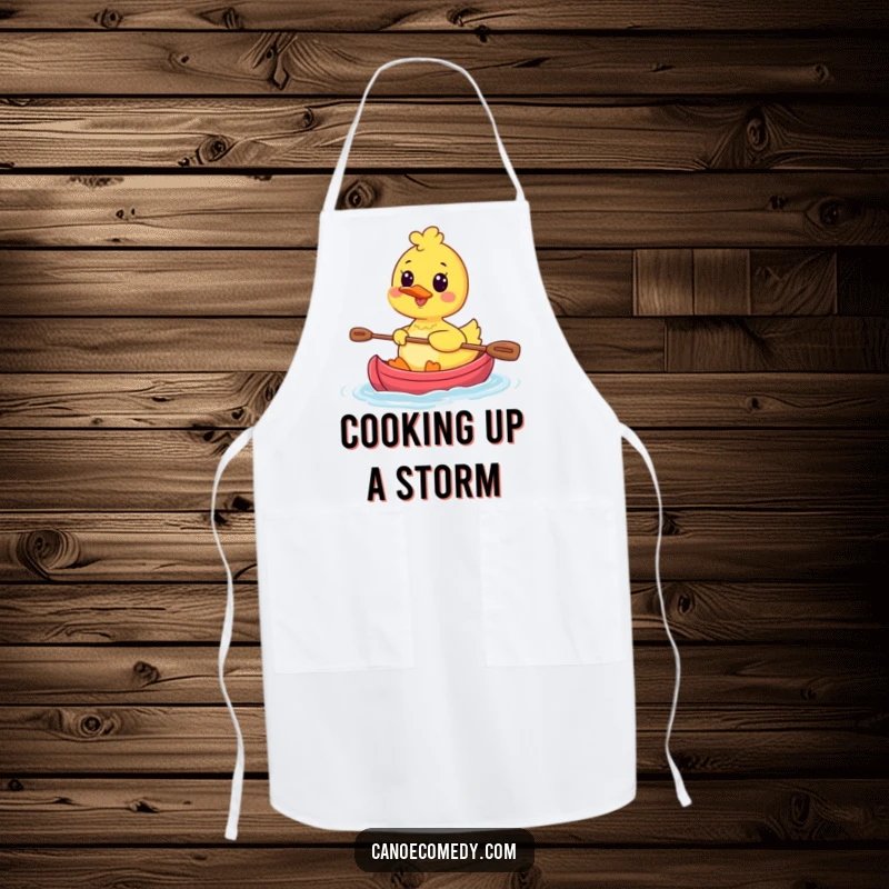 Funny Kawaii Duck Chef's Apron showing a happy duck character paddling a tiny canoe, ready to prepare delicious meals.