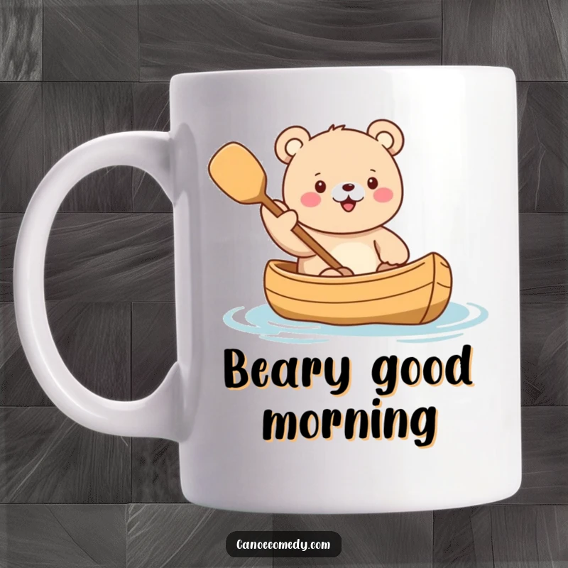 Funny Kawaii Bear Canoe Mug showing a cute bear character enthusiastically waving a paddle while sitting in a canoe.