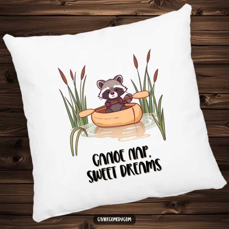 Funny decorative pillow featuring a raccoon navigating a canoe through reeds, adding comfort and witty charm.