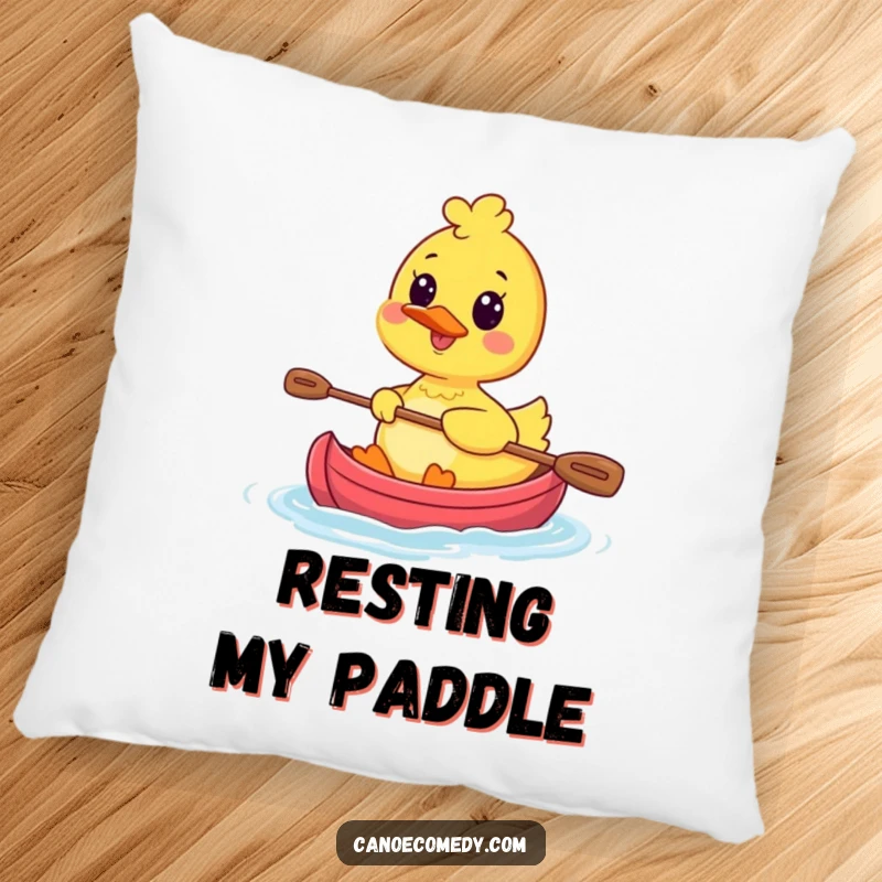 Funny Kawaii Duck Serenity Pillow featuring a happy duck character peacefully paddling a tiny canoe, offering soft, amusing comfort.