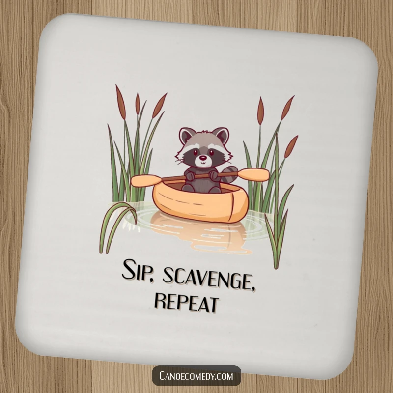 Funny drink coaster showing a raccoon navigating a canoe through reeds, adding humor and protection to tabletops.