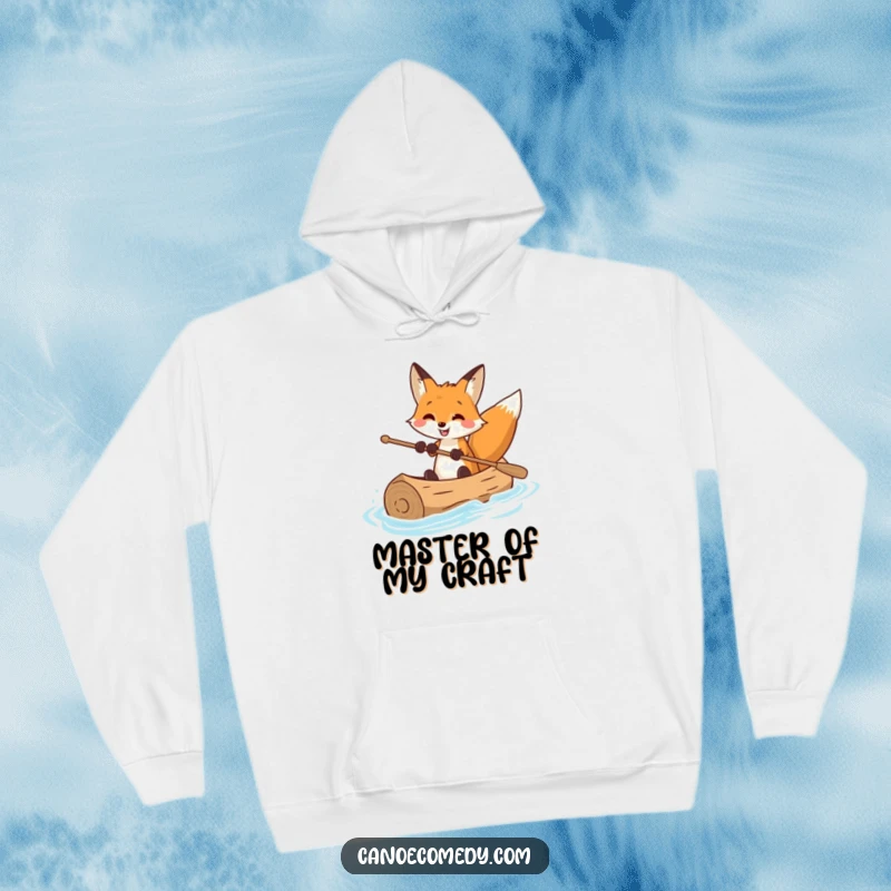 Funny hoodie with a smiling fox expertly guiding a log canoe, offering warmth and humorous charm for any adventurer.