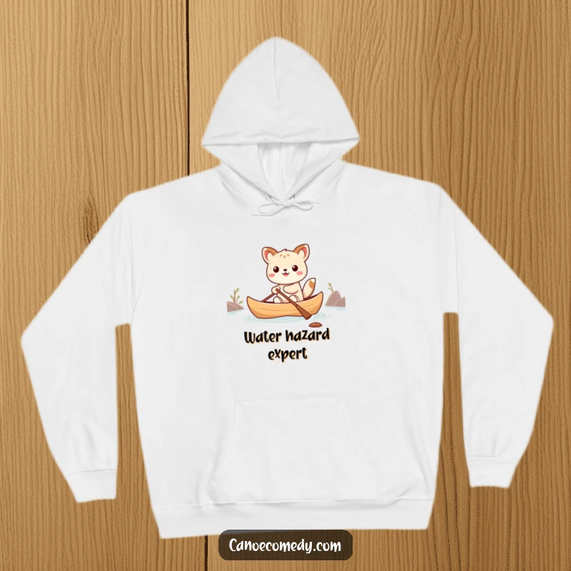 Funny Kawaii animal character humorously wobbling in a small canoe, printed on a cozy hoodie, perfect for laughs.