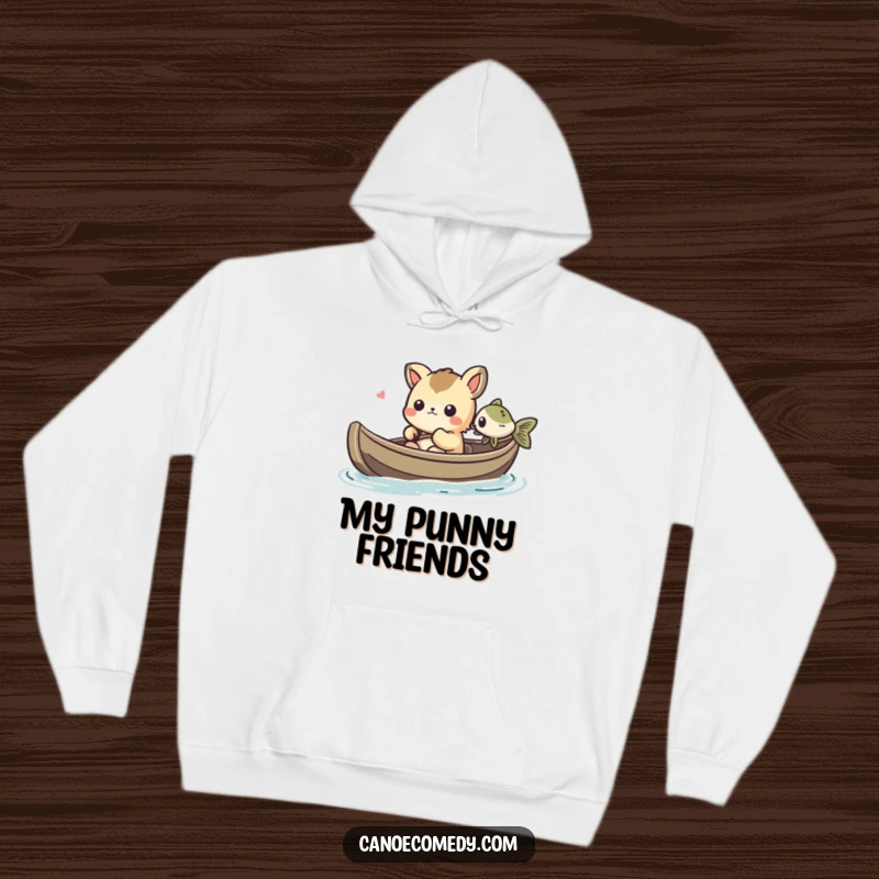 Funny Kawaii animal character in a canoe, amused by a fish, featured on a comfortable hoodie.