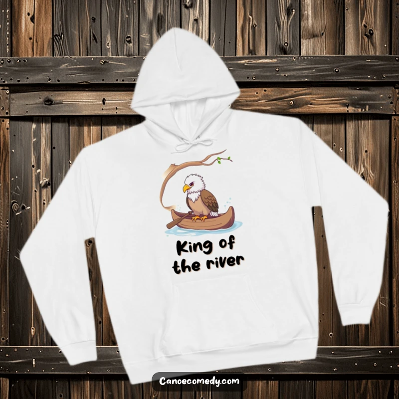 Funny, warm hoodie featuring a majestic eagle perched calmly in a canoe, observing everything.
