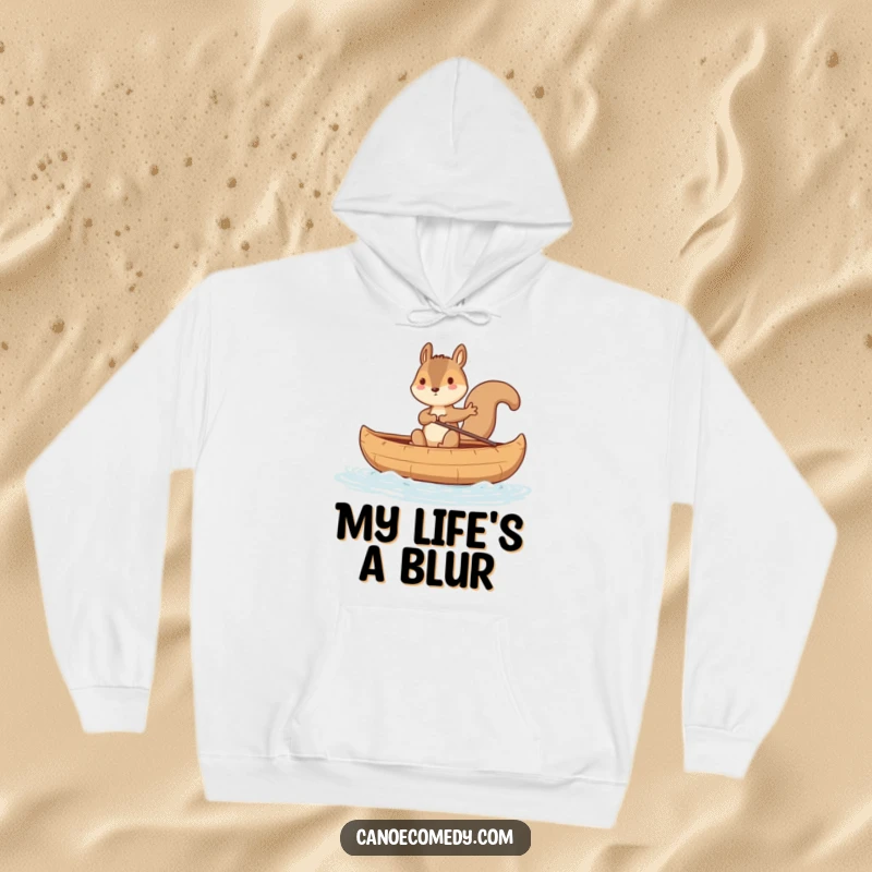 Funny squirrel character in a precarious balancing act on a rocking canoe, making this a humorous and cozy hoodie gift.