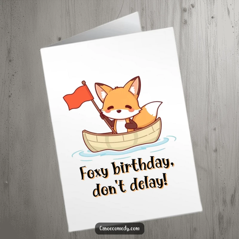 Funny Free Printable Birthday Card: A clever fox in a small canoe waves a celebratory flag, perfect for a unique occasion.