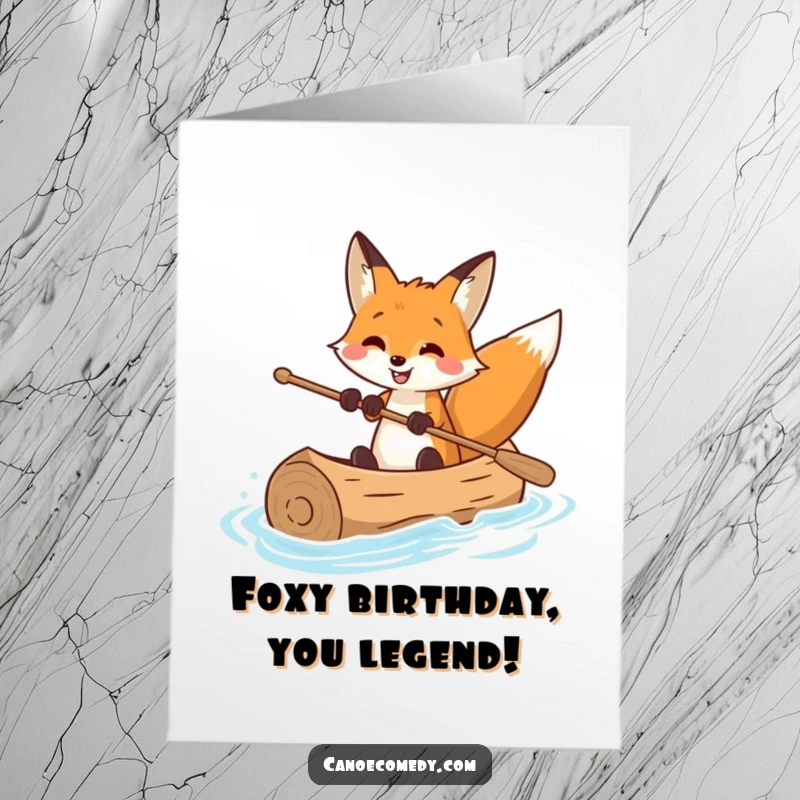 Funny Free Printable Birthday Card: A fox with a huge smile expertly paddling a log canoe, full of birthday cheer.