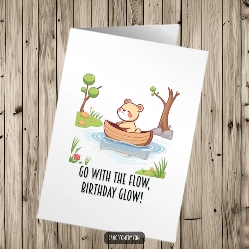 Funny Free Printable Birthday Card: An animal giggling while its canoe drifts gently down a calm stream, spreading joy.
