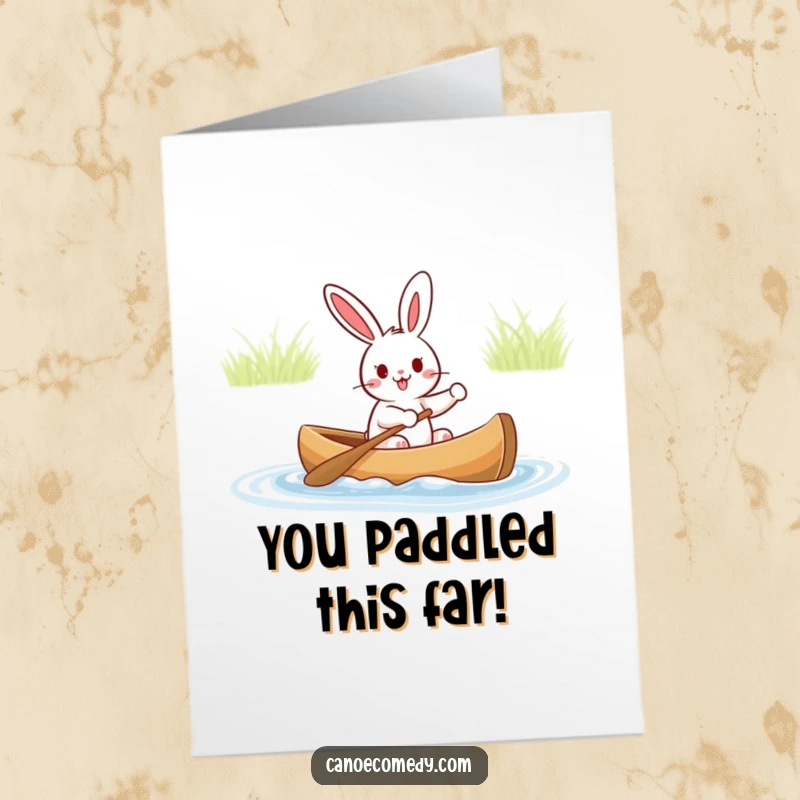 Funny Free Printable Congratulations Card: Cheerful rabbit navigating a canoe with glee, celebrating success with humor.