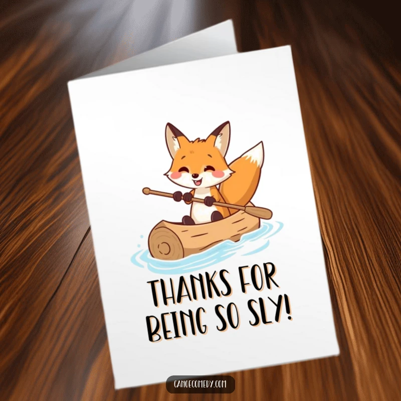 Funny Free Printable Thank You Card: A fox with a wide smile expertly navigating a log canoe, conveying thanks.