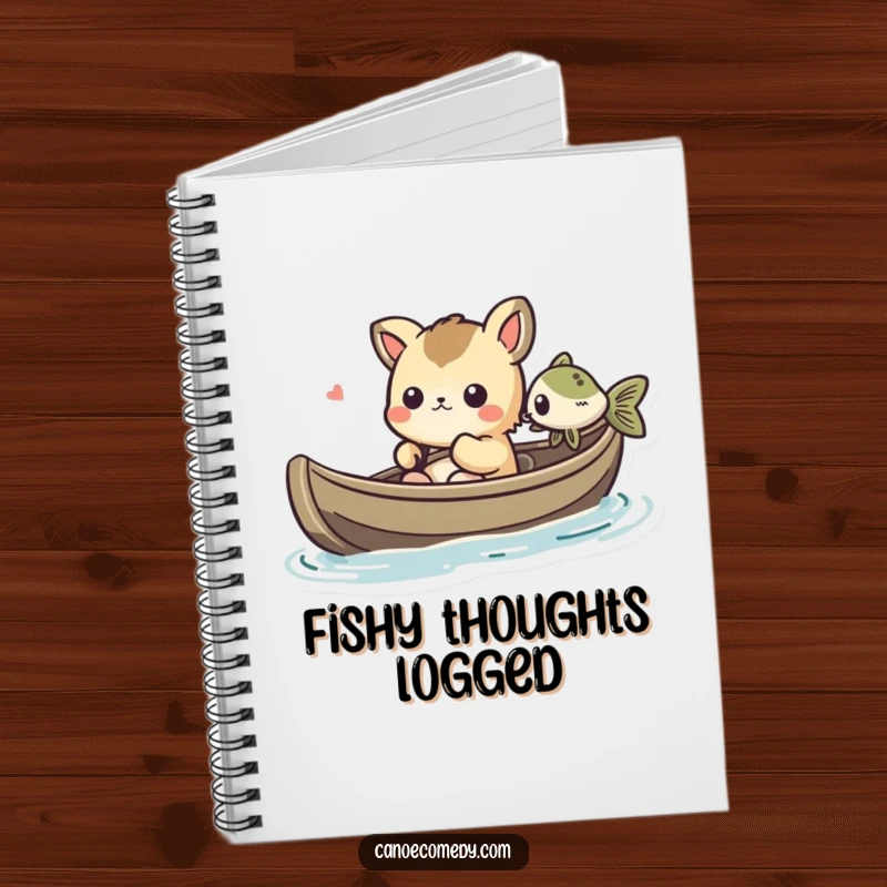 Funny Kawaii animal character in a canoe, amused by a fish, shown on the cover of a notebook.