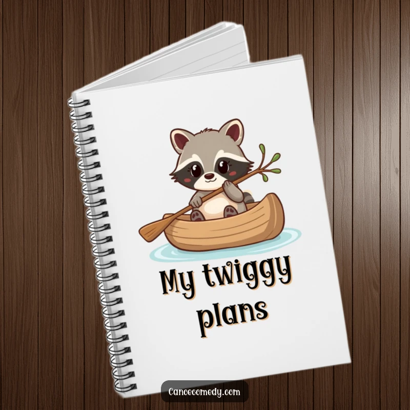 Funny Kawaii raccoon steering a canoe with a twig, a humorous and inspiring notebook.