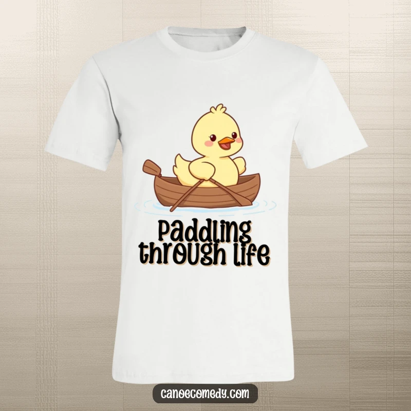 Kawaii duck character in a tiny canoe, paddling happily, printed on a charming and funny t-shirt.