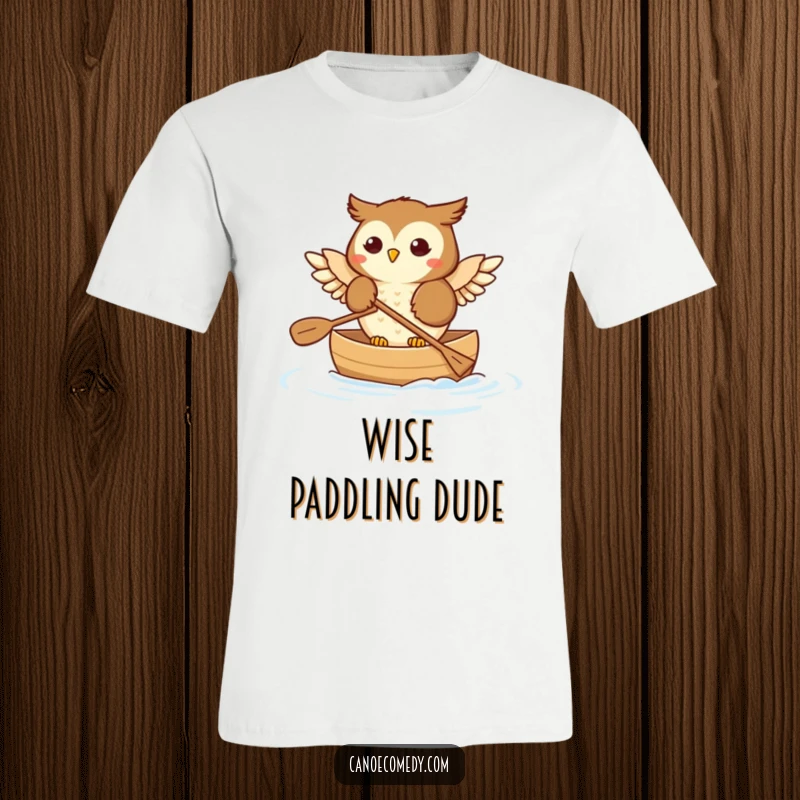 Funny Owl T-Shirt: A whimsical illustration of a happy owl paddling a canoe with its wings dipping into the water.