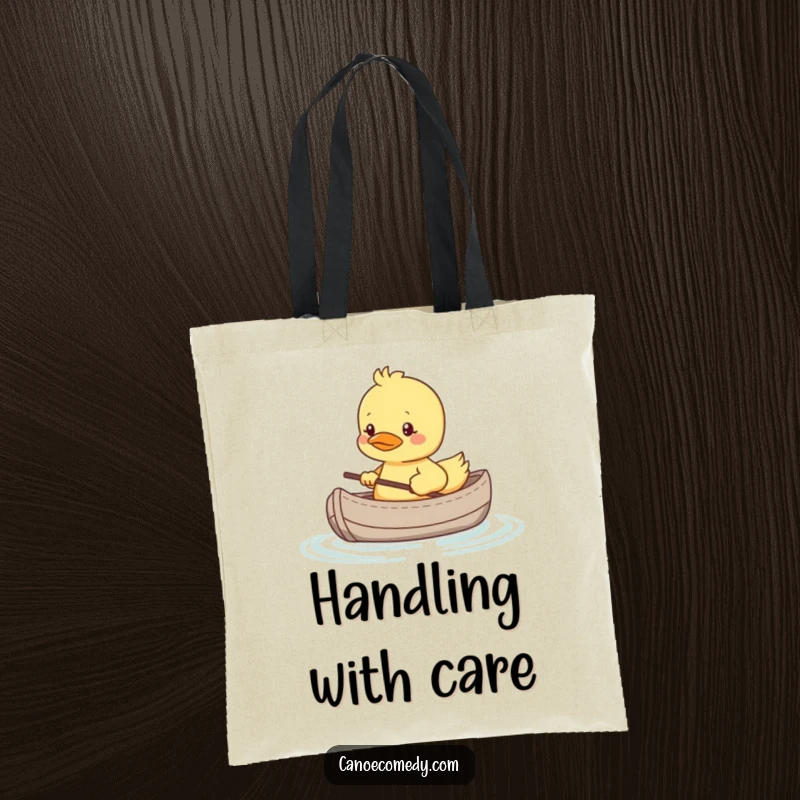 Funny tote bag featuring a shy kawaii duckling in a tiny canoe, looking nervous, perfect for humorous, practical use.