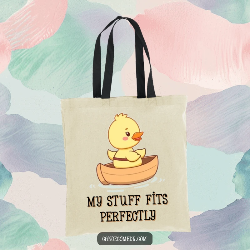 Funny happy duckling tote bag riding in a tiny canoe with a big smile, cute and cheerful for everyday use.