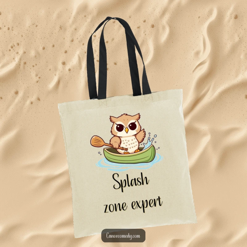 Funny owl tote bag, playfully splashing water from a canoe with a paddle, a fun and functional accessory.